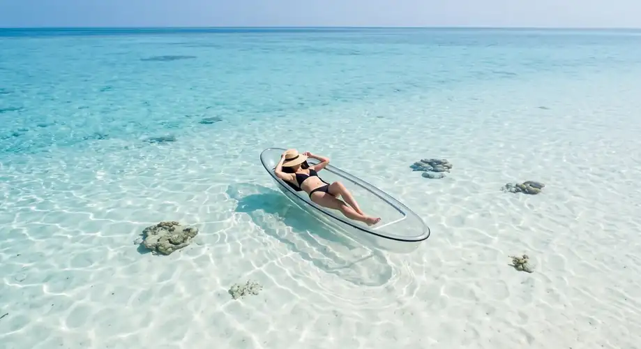 Sea kayaking in the turquoise waters near Turtle Seaweed Resort